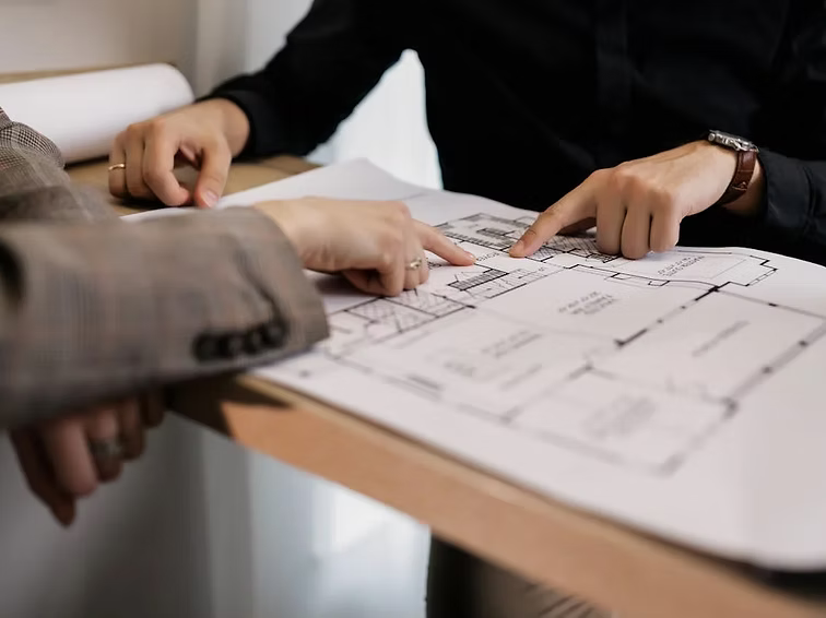 Consultant discussing with a client about their renovation